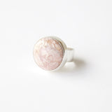 Rhodochrosite gemstone ring in sterling silver - front left side