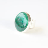large green malachite gemstone ring - semi precious gemstone ring set in gold with a sterling silver ring - left front view