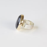 blue goldstone gemstone round ring in 9ct gold - silver band side