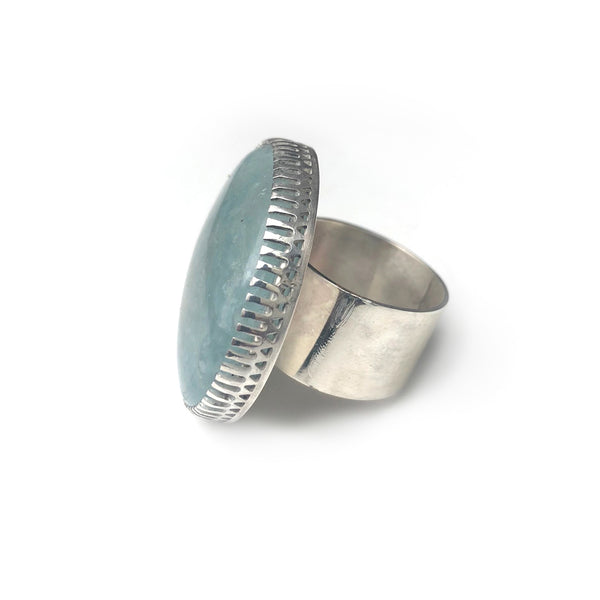 aquamarine gemstone ring in sterling silver - handmade by alice eden - side view of silver band
