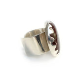 carnelian gemstone ring set in a sterling silver setting - right side adjustable band