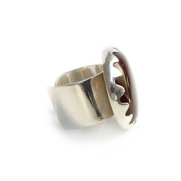 carnelian gemstone ring set in a sterling silver setting - right side adjustable band