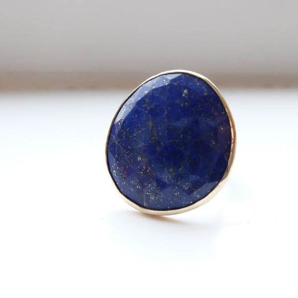 lapis lazuli gemstone ring set in gold with a sterling silver ring - front view of semi precious stone