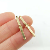 A Pair of Vintage 9ct Gold Snow Ski Charms