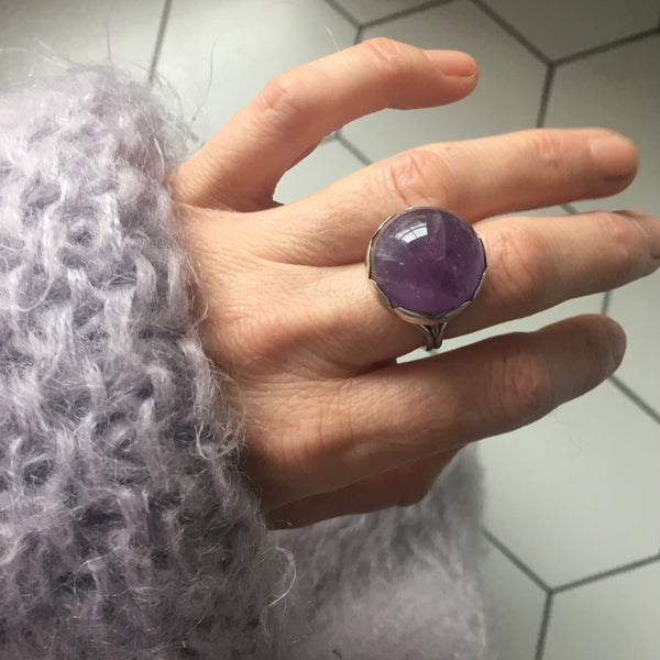 Sterling Silver Gemstone Ring with a unique round Amethyst stone - on hand from above