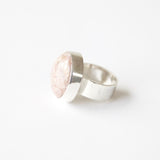 Rhodochrosite gemstone ring in sterling silver - left side with silver band