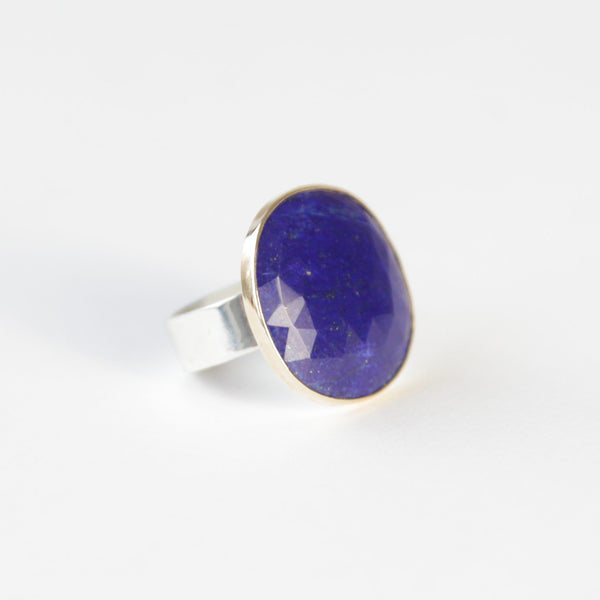 lapis lazuli gemstone ring set in gold with a silver ring - right side