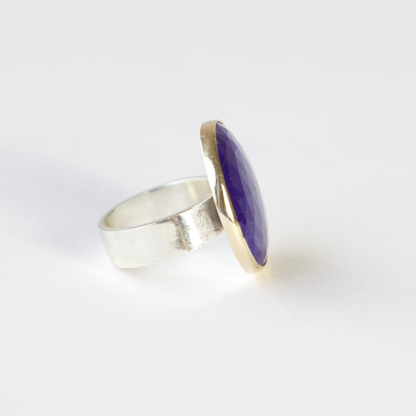 lapis lazuli gemstone ring set in gold with a silver ring - right side with ring