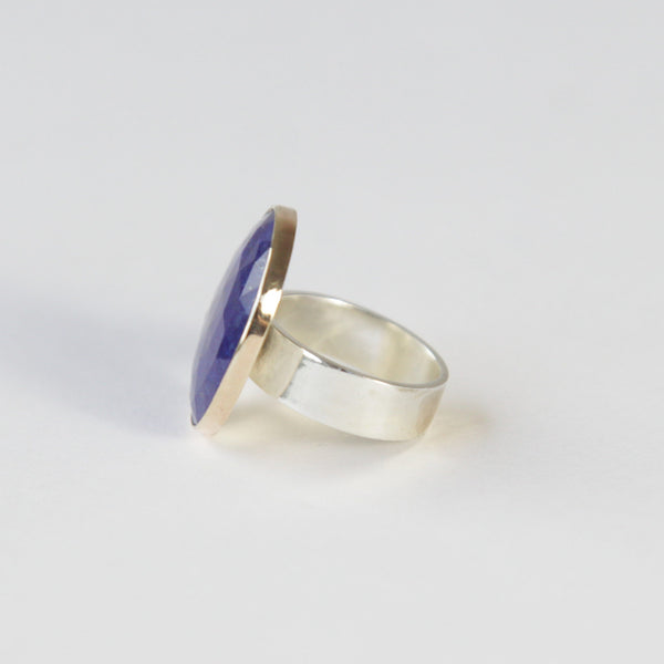 lapis lazuli gemstone ring set in gold with a silver ring - left side with ring