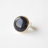 blue goldstone gemstone round ring in 9ct gold - silver band