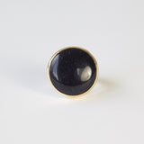 blue goldstone gemstone round ring in 9ct gold - top