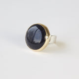 blue goldstone gemstone round ring in 9ct gold - side view