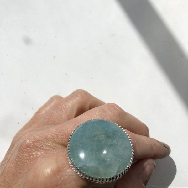 aquamarine gemstone ring in sterling silver - handmade by alice eden - worn on hand