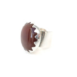 carnelian gemstone ring set in a sterling silver setting - side view