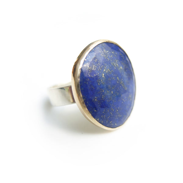 lapis lazuli gemstone ring set in gold with a sterling silver ring - right front view