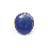 lapis lazuli gemstone ring set in gold with a sterling silver ring