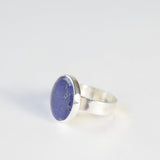 lapis lazuli flat cut gemstone ring set in gold with a sterling silver ring band - from left side