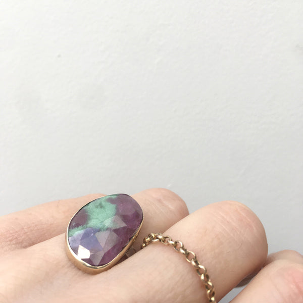 Ruby Zoisite gemstone ring set in gold with a sterling silver band