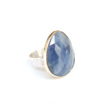 sapphire gemstone ring - faceted semi precious stone in a gold setting with silver ring - right side