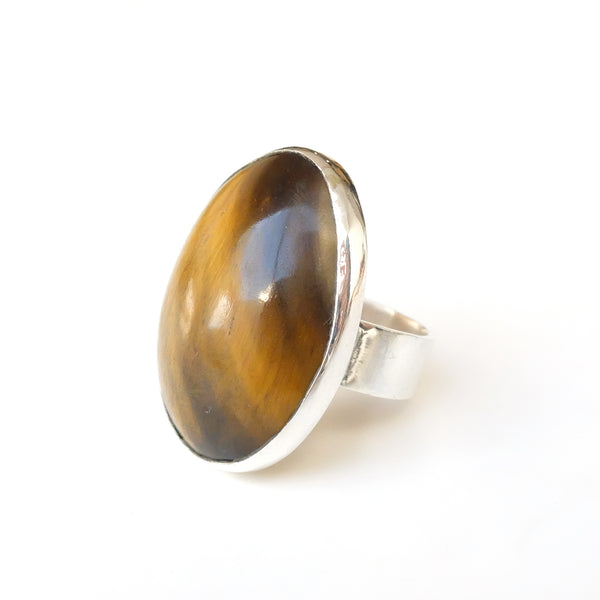 Oval Tigers Eye Gemstone Ring set in sterling Silver - from left