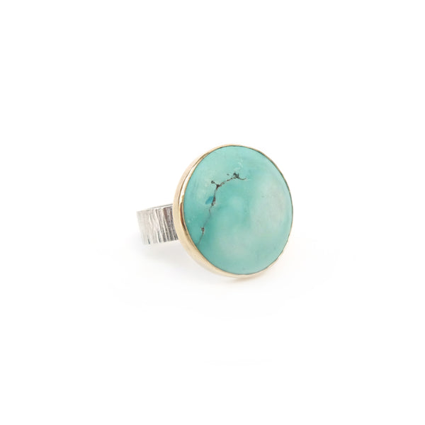 bright tibetan turquoise gemstone ring set in 9ct gold and sterling silver - front 
