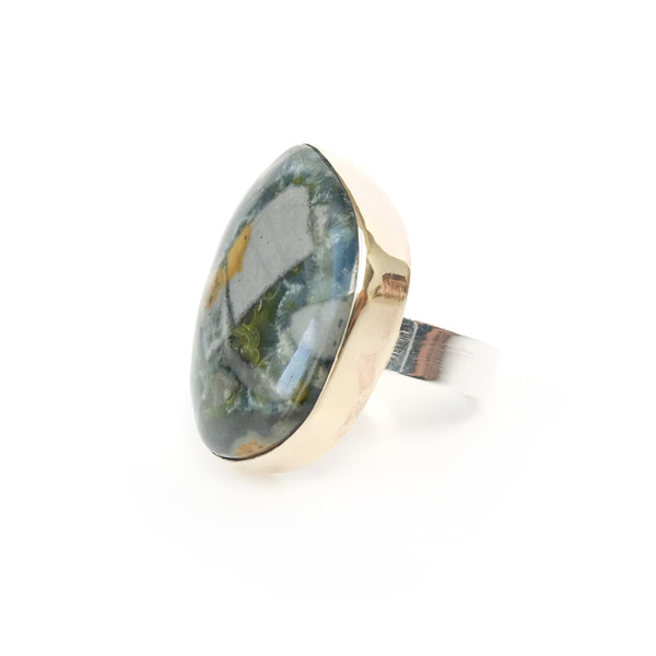 wavelite gemstone ring in sterline silver - set in gold with right side silver band